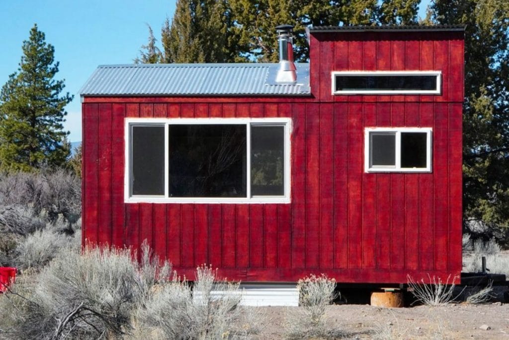 Back side of red tiny house